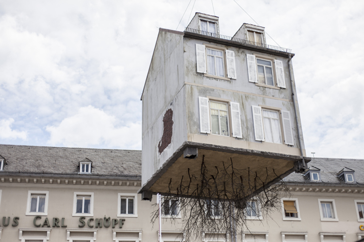 pulled-by-the-roots-installation-by-leandro-erlich-2