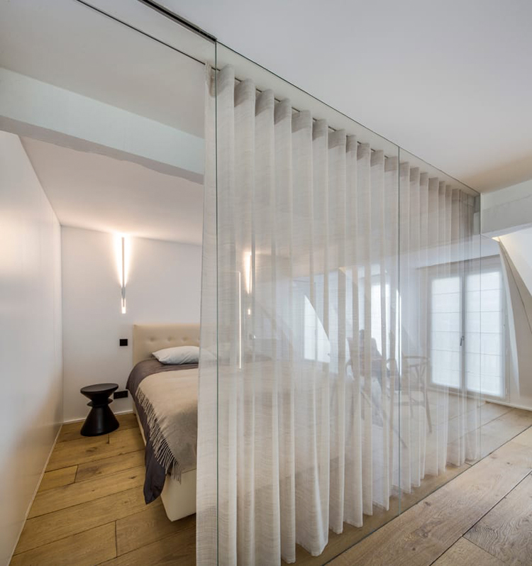 Vincent Parreira Turns 19th Century Photography Studio into two light-filled apartments in Paris