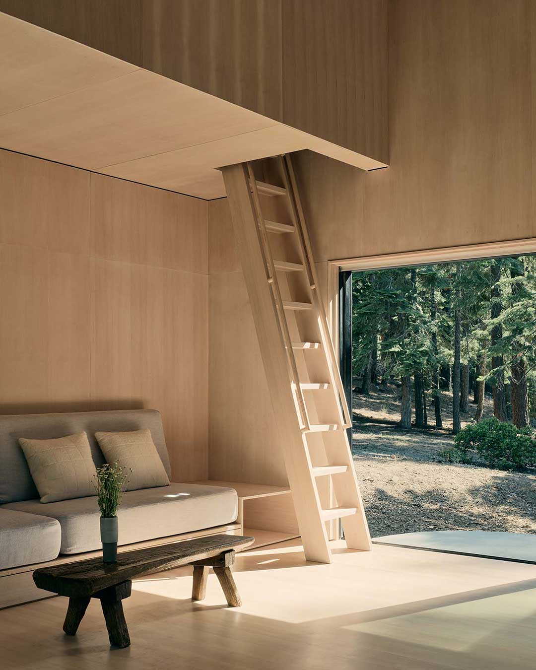 The sensory experience of Staggered Cabin is one of camouflage and texture. Clad in rough-sawn western red cedar stained to a deep hue, the residence recedes into the shadows of the Tahoe forest, its vertical cladding echoing the straight trunks of the surrounding pines. Inside, the "social heart" of the home—a Douglas fir-lined Great Room—replaces traditional hallways with a fluid, rhythmic layout that celebrates discovery through varying floor levels and sun-drenched reading nooks.

By blending the playful spirit of the Californian A-frame with the rational precision of Nordic craft, Mork-Ulnes Architects has created a dwelling that doesn't just sit on the mountain; it participates in its rituals. From the standing-seam roofs engineered to trap snow as natural insulation to the repurposed timber furniture, every detail reflects a commitment to material honesty and a rejection of the superfluous.

via #urdesignmag 
architects @morkulnesarchitects 
images @joefletcherphoto 

#MorkUlnesArchitects #AlpineArchitecture #CabinDesign #SouthLakeTahoe #SustainableArchitecture #ModernCabin #NordicDesign #TimberArchitecture #InteriorInspiration #ArchitecturePhotography #SierraNevada #MinimalistHome