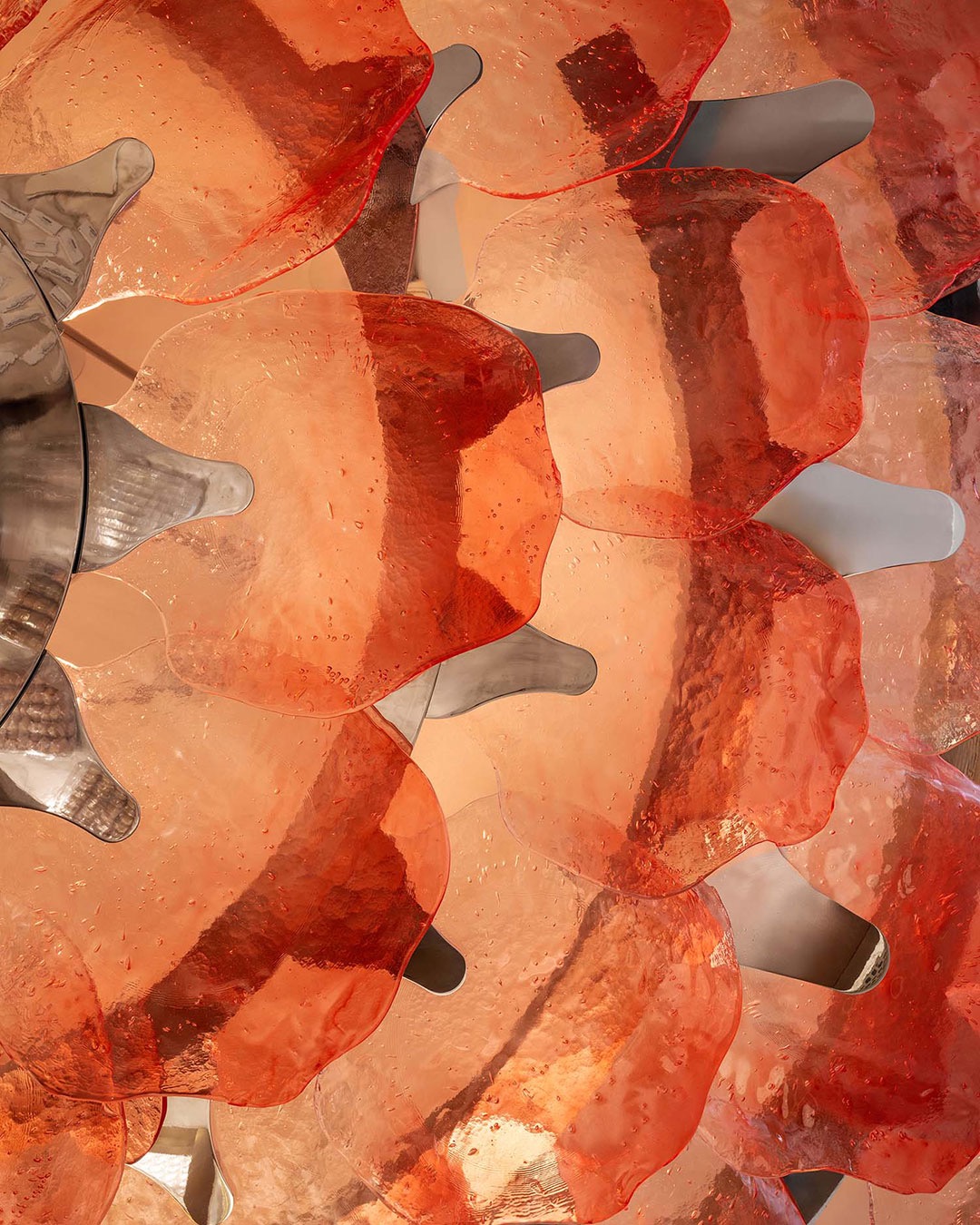 Step into a poetic threshold where the DNA of a Parisian street café meets the verdant richness of a tropical garden. In Singapore’s new Pierre Hermé flagship, CCD / Cheng Chung Design has crafted a physical dialogue between French refinement and Southeast Asian vitality. Signature macaron sculptures are nestled among dense foliage like discovered fruits, while soft, strategic illumination emphasizes the vivid, natural pigments of the pastry craft.  The interior is a study in materiality: smooth, polished brass and curved glass counters meet warm, natural wood cabinetry and plush velvet seating. Every element, from the surgical precision of the curved display counters to the eco-conscious cloth packaging, reflects a discipline that mirrors the prestige of haute pâtisserie. It is an atmospheric fusion where the philosophy of “pleasure as a compass” is felt through every tactile finish and spatial curve.  via #urdesignmag
architects @ccd_chengchungdesign
images Boris  #CCD #PierreHerme #SingaporeDesign #LuxuryRetail #InteriorArchitecture #HautePatisserie #SustainableDesign #SpatialStorytelling #BespokeInteriors #RetailArchitecture #AsianDesign #FrenchElegance