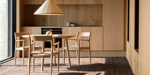 Linear kitchen and dining table with chairs