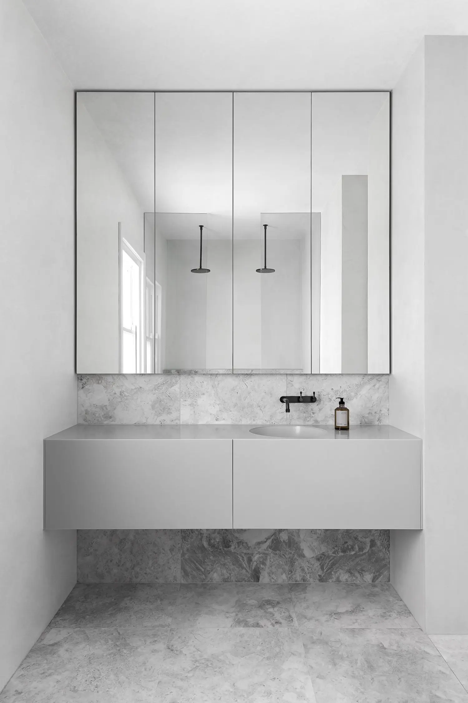 Modern minimal bathroom with marble and sink cabinet
