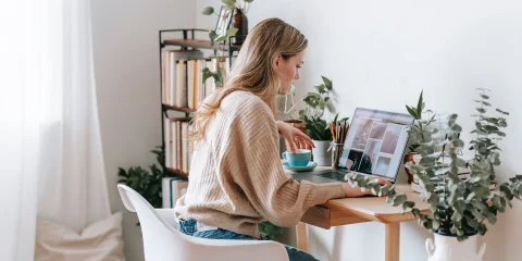 woman works from her home office
