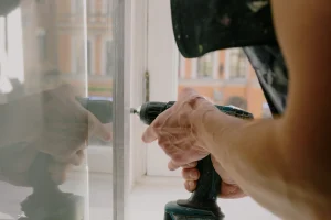 Blacksmith replaces a window