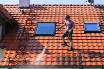 Low pressure roof cleaning