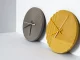 Couple of wall clocks with geometric and essential design
