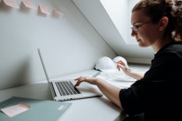 Close-up Photo of Female Architect using Laptop