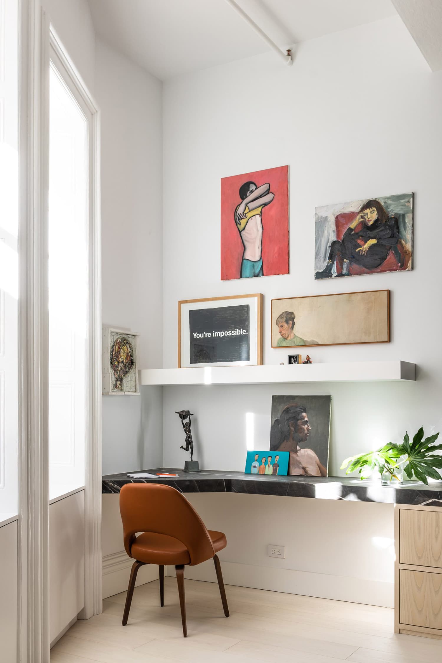 Home office corner decorated with wall paintings