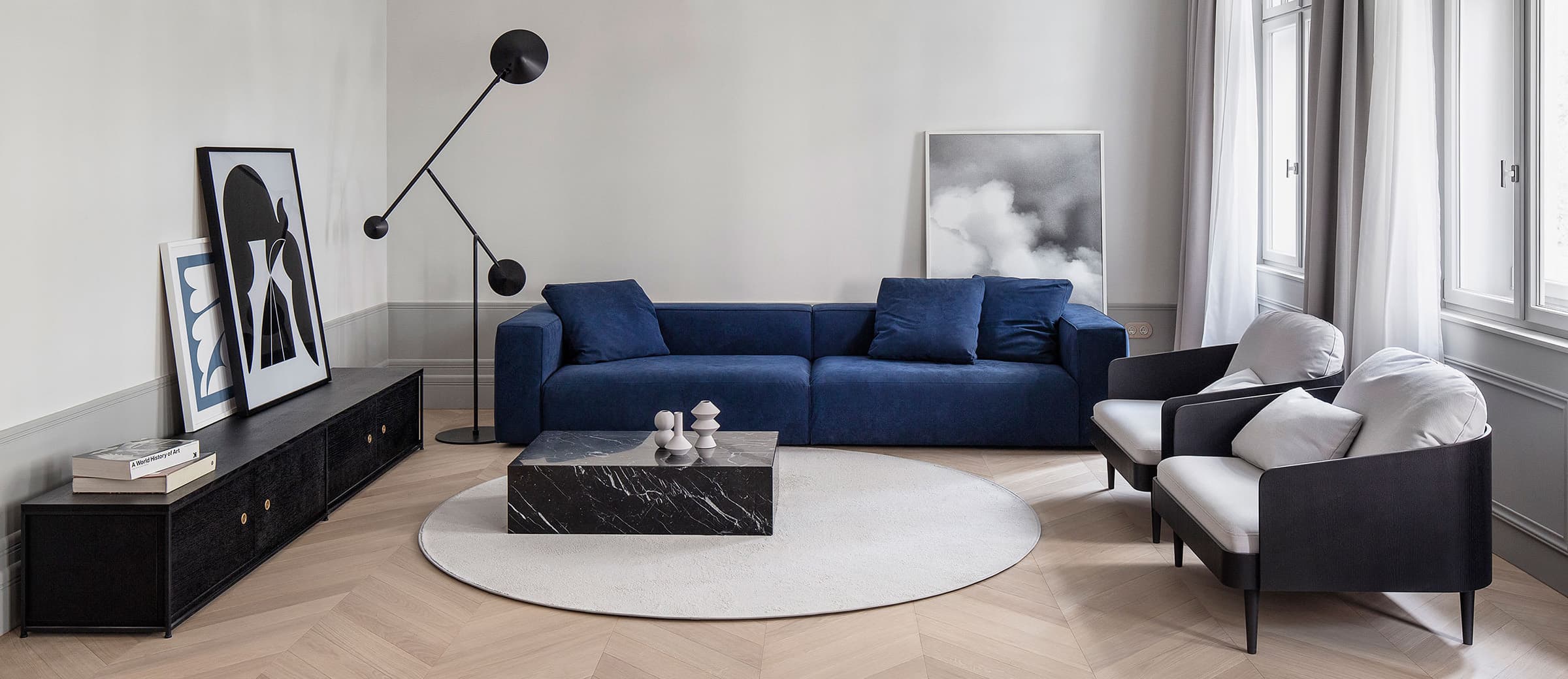Sofa blue with black marble coffee table