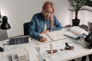Female designer writes a critical design review