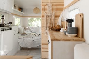 Camping in trailer, rv kitchen and bedroom