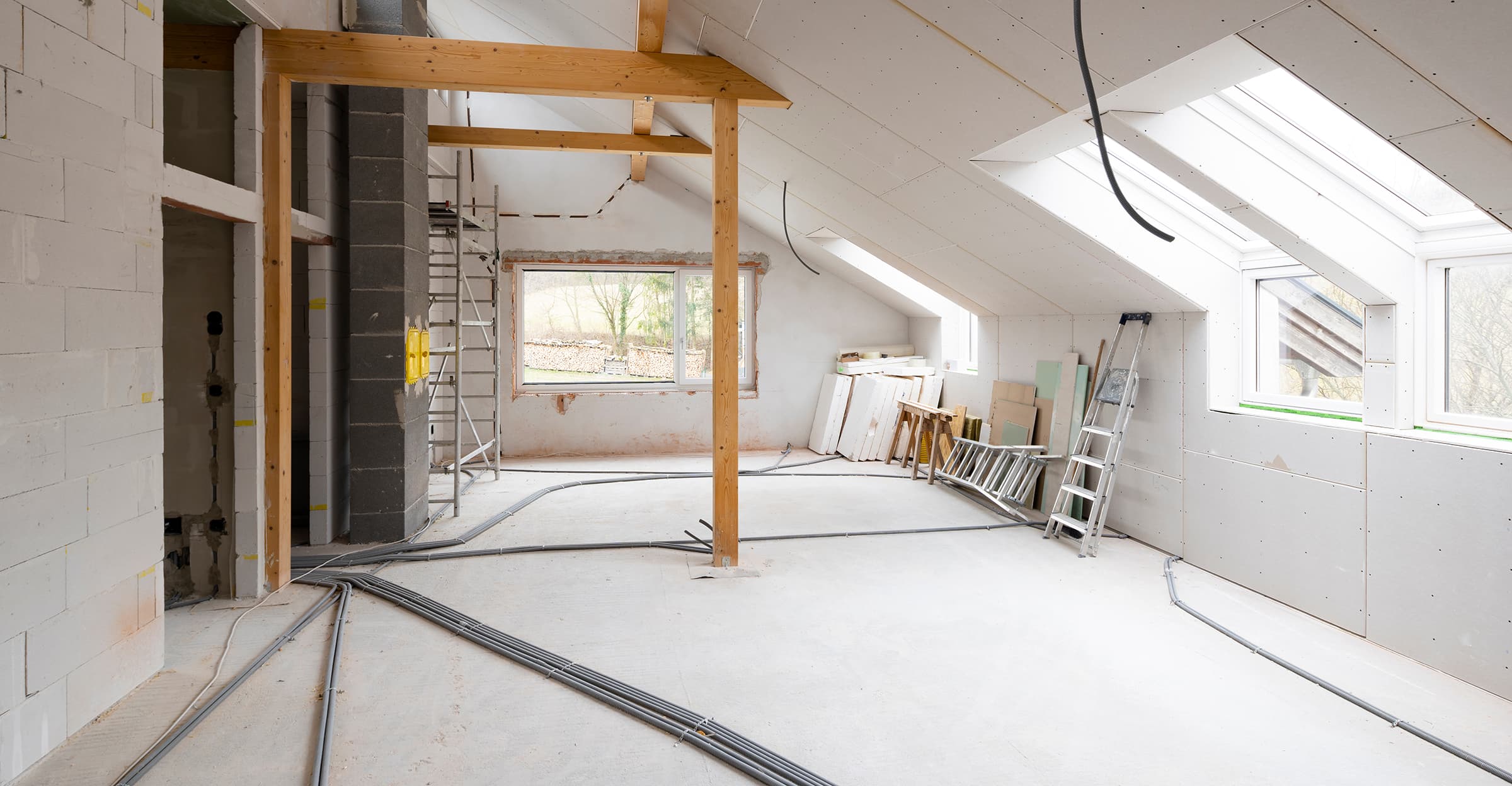 bright, friendly, modern loft construction site drywall without people in daylight