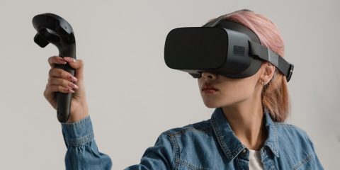 A Woman Using a Virtual Reality Set