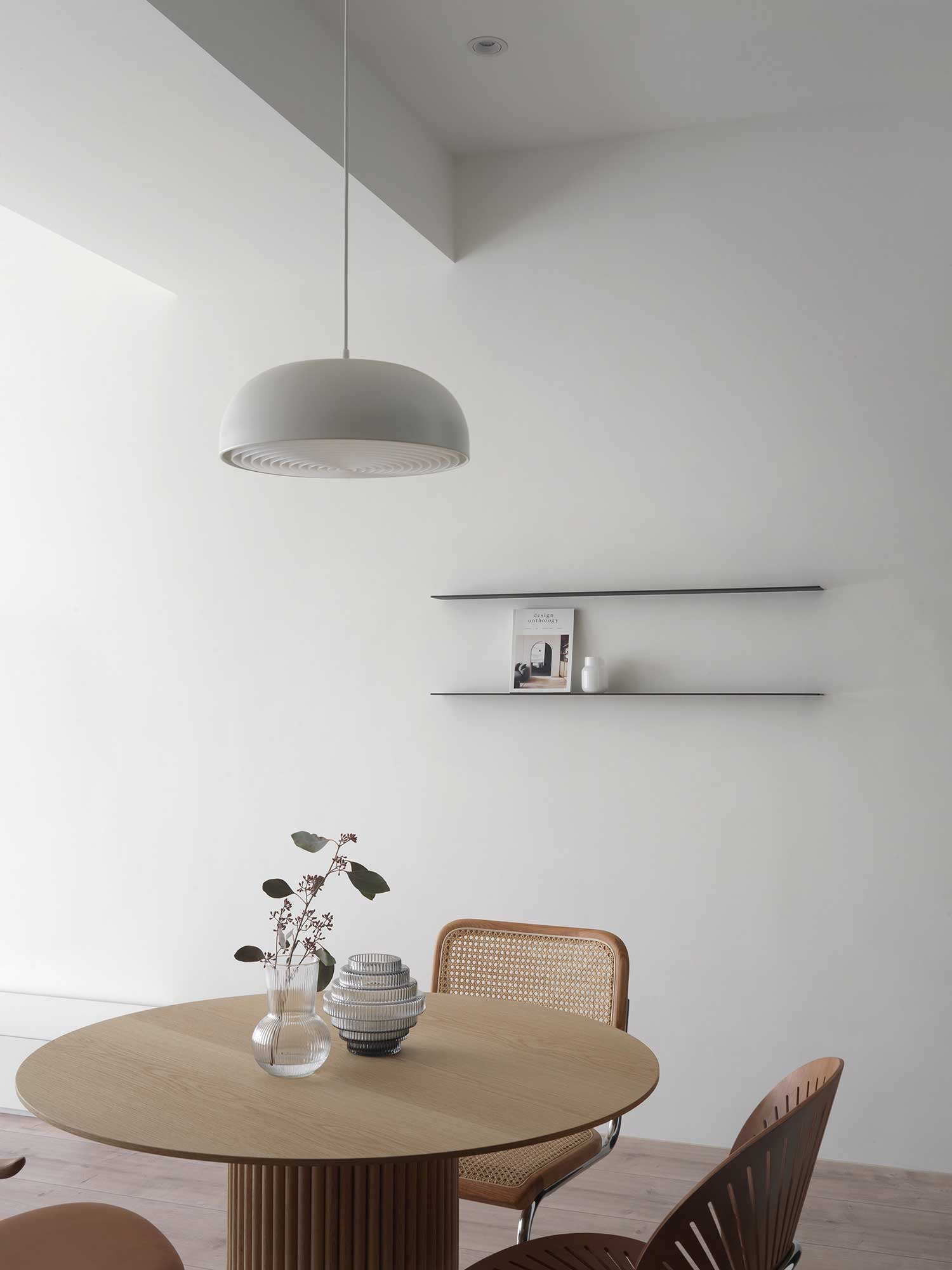Dining table with chairs and pendant lamp