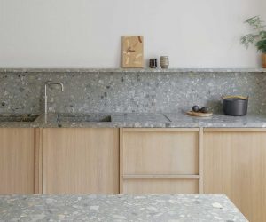 Wooden kitchen with stone countertop