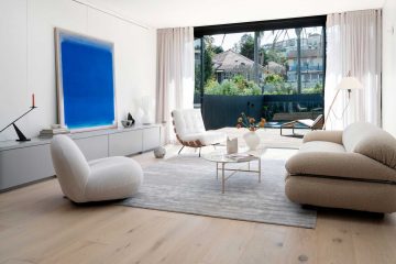 Living room with modern cream-colored furniture