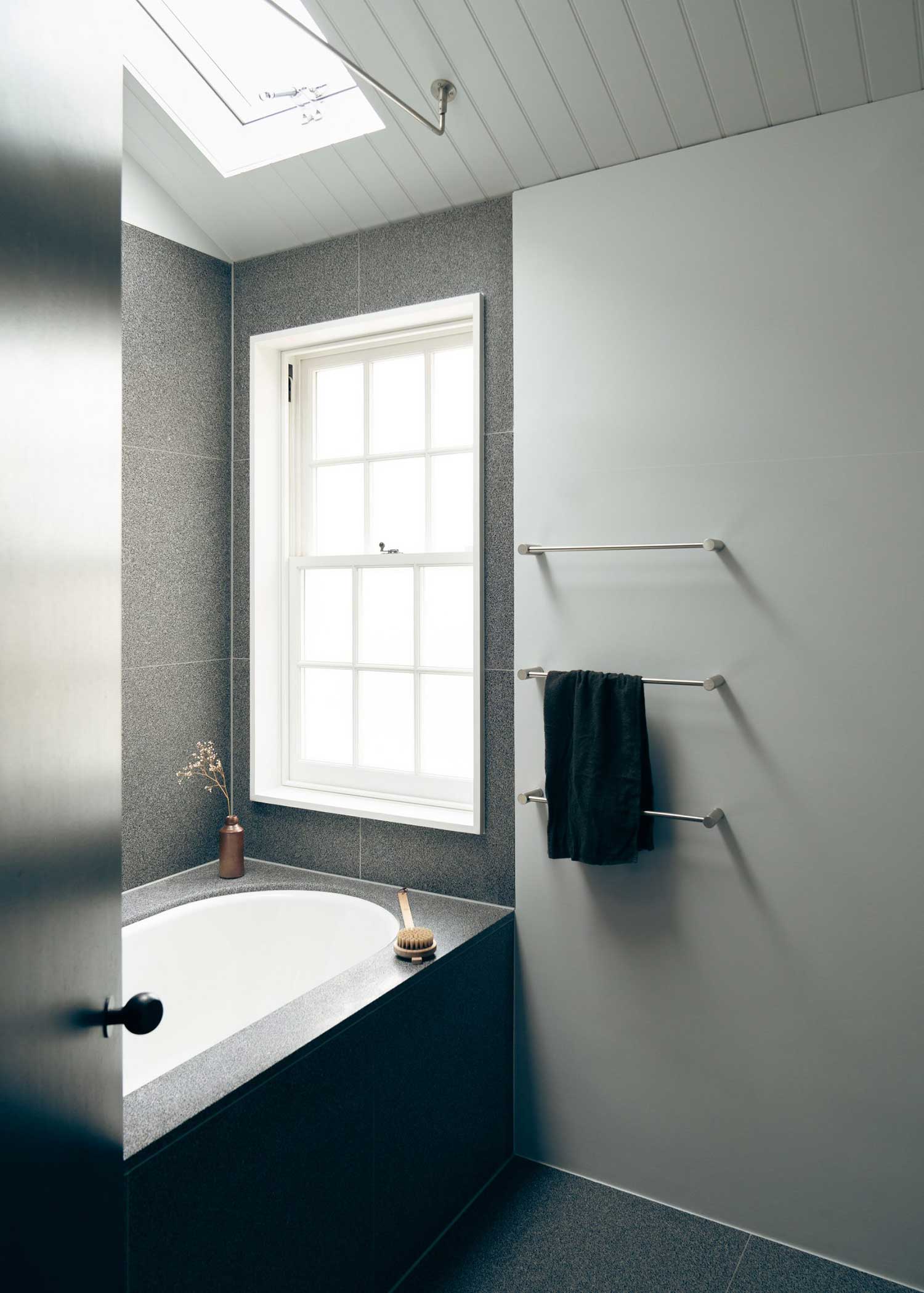 Modern two-tone bathroom with bathtub