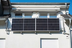 Photovoltaic panels fixed on the facade of a house