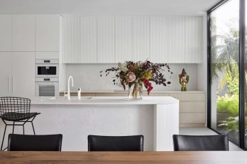 White kitchen with flower vase