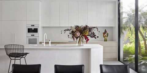 White kitchen with flower vase