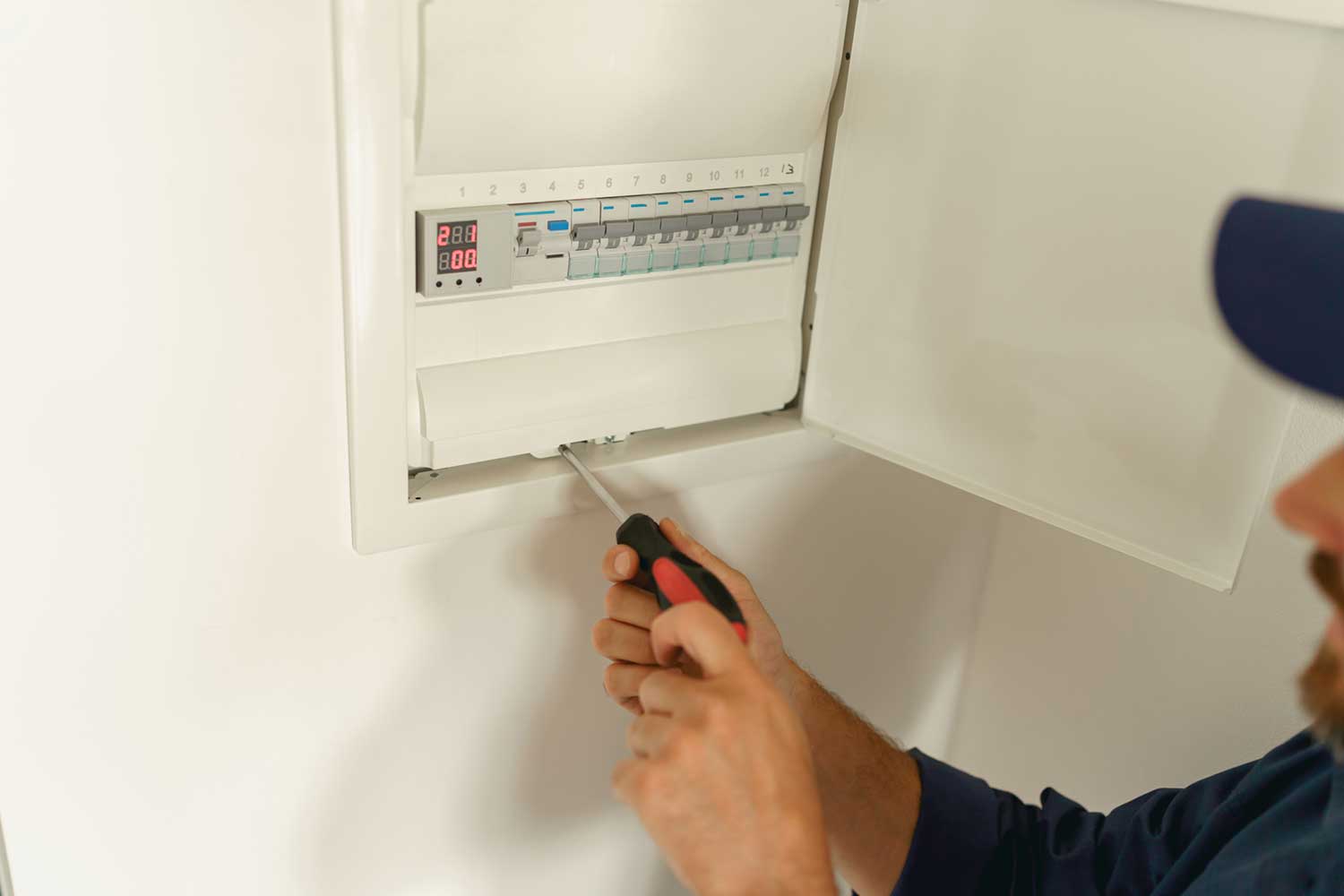 Close up of male electrician inspect and repairing electrical systems in houses and buildings