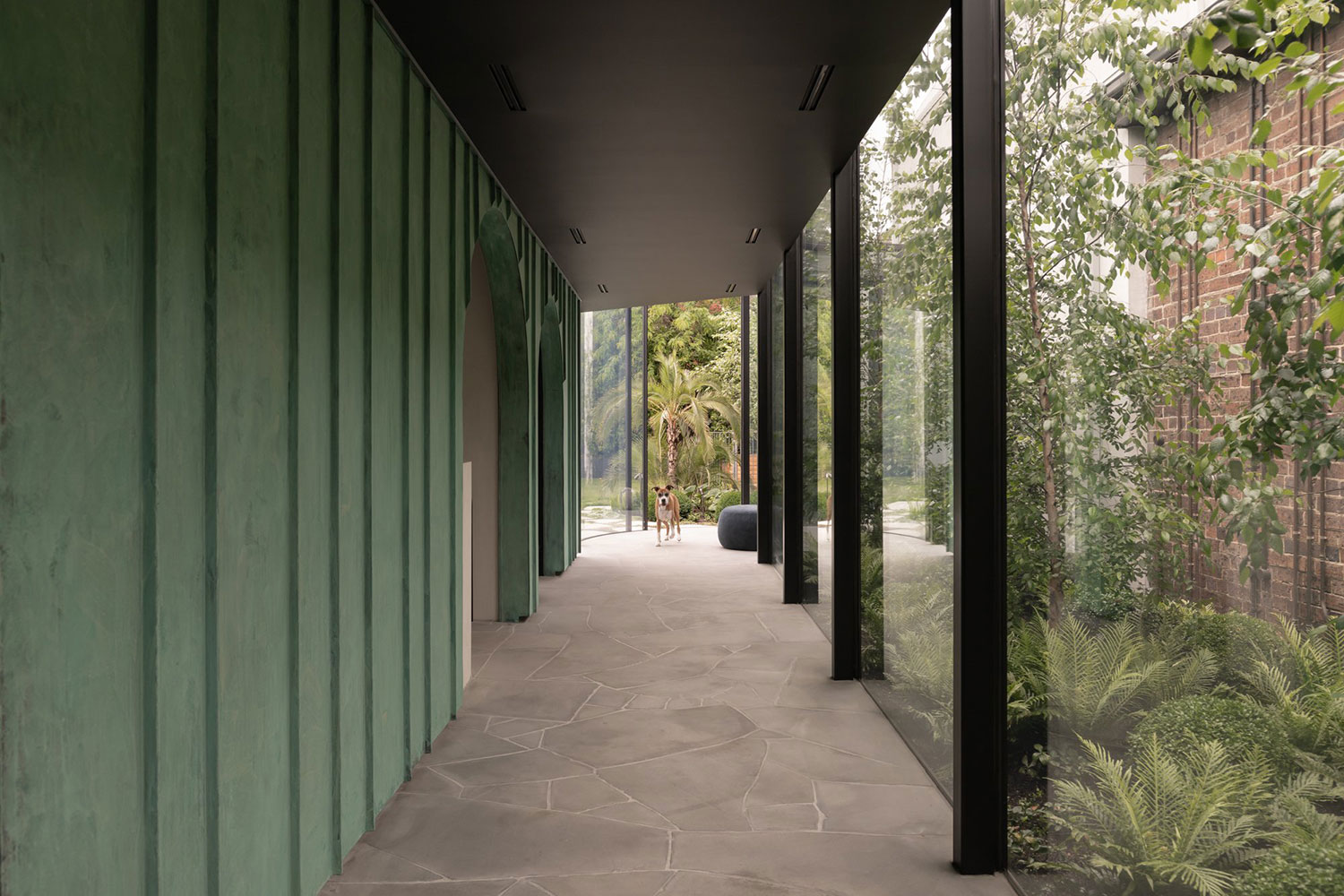 A copper-clad extension by Blur Architects, seamlessly blending modern design with the South Yarra landscape.