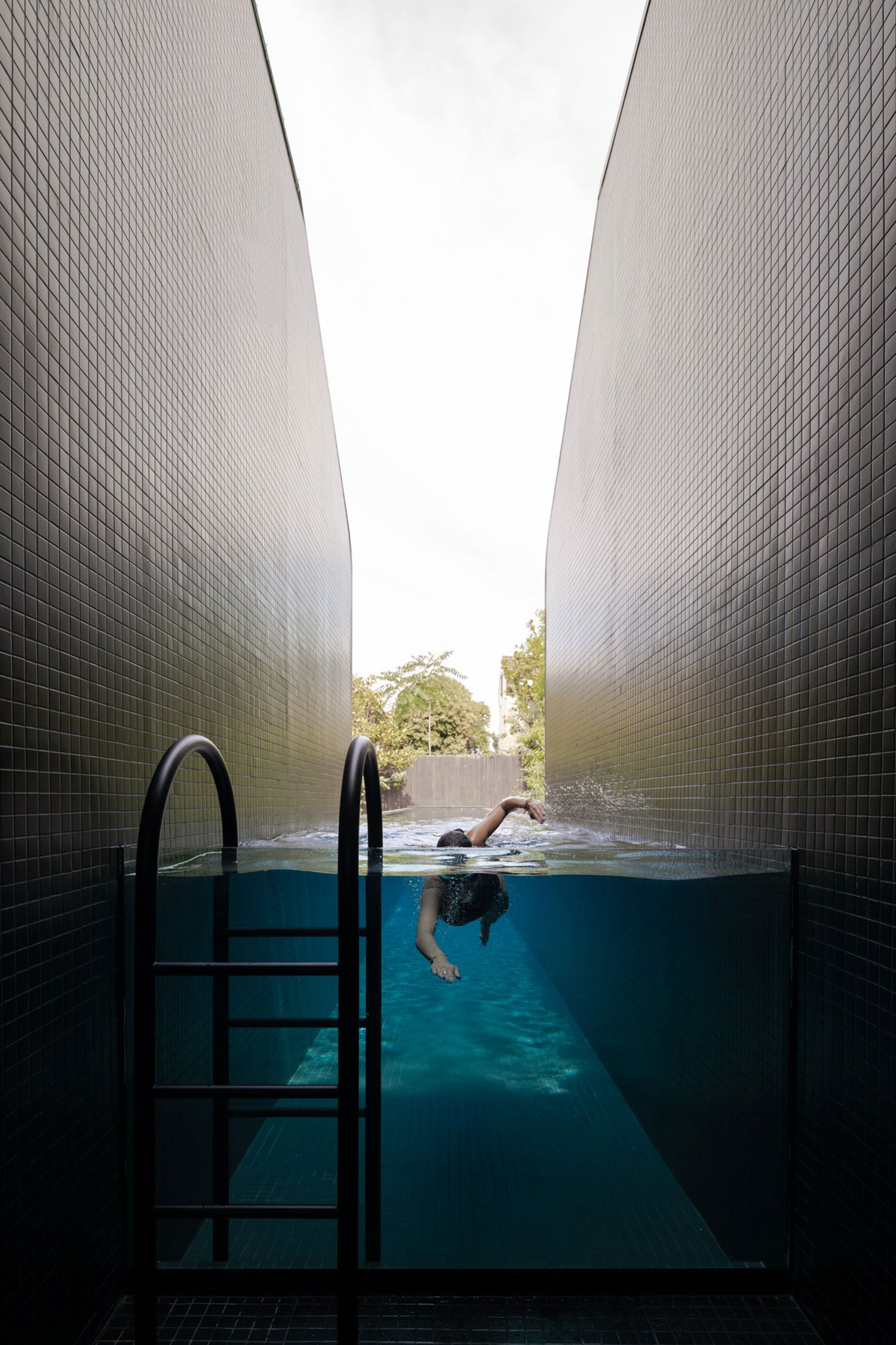 A copper-clad extension by Blur Architects, seamlessly blending modern design with the South Yarra landscape.