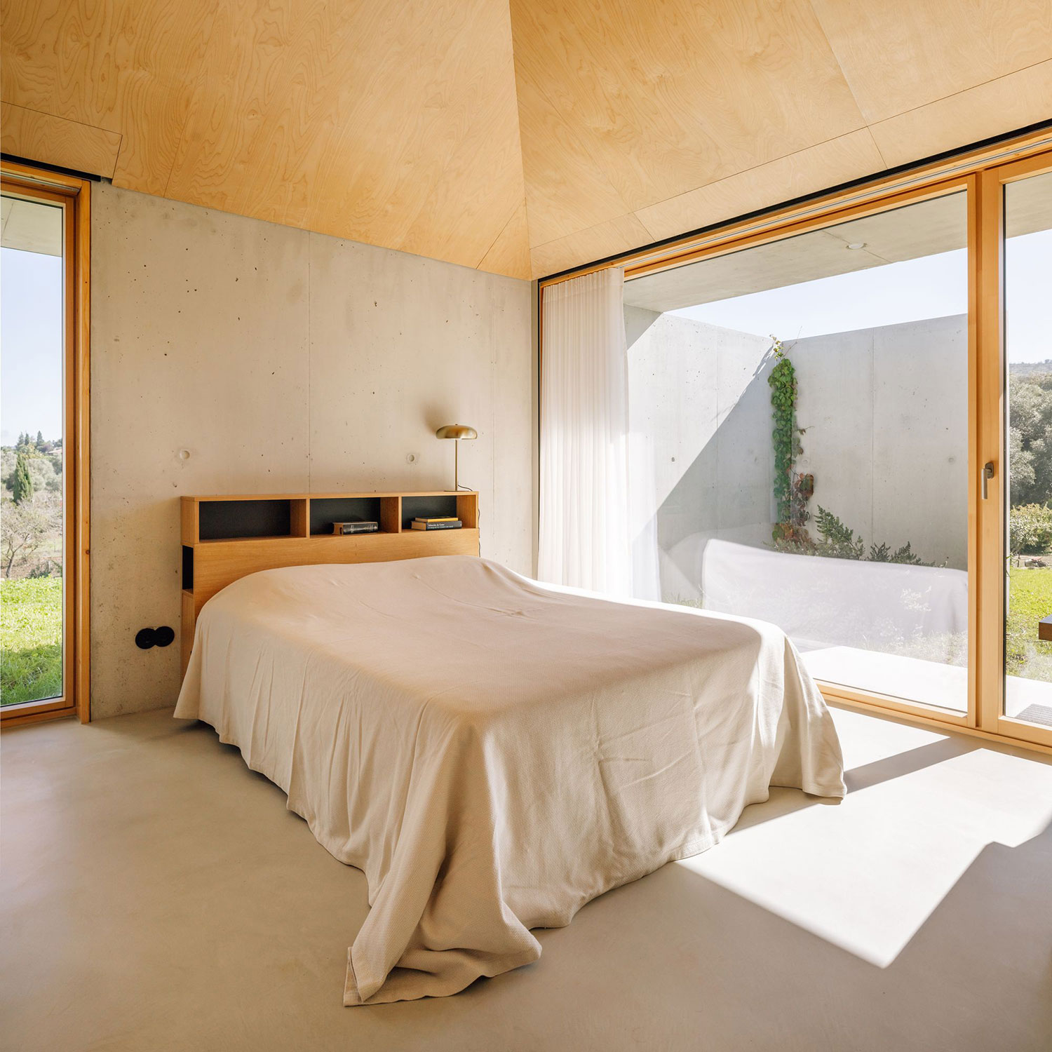 Concrete & Birch: Cimbre's Striking Arrábida House Design