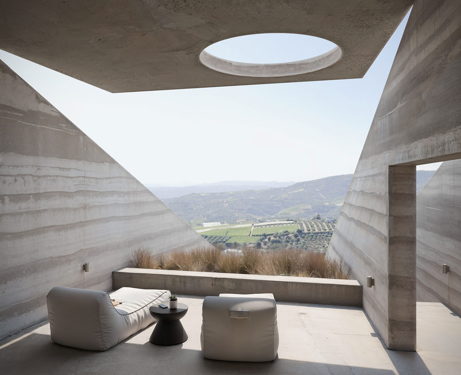 N'arrow House: Sustainable Rammed Earth Design by Mykonos Architects