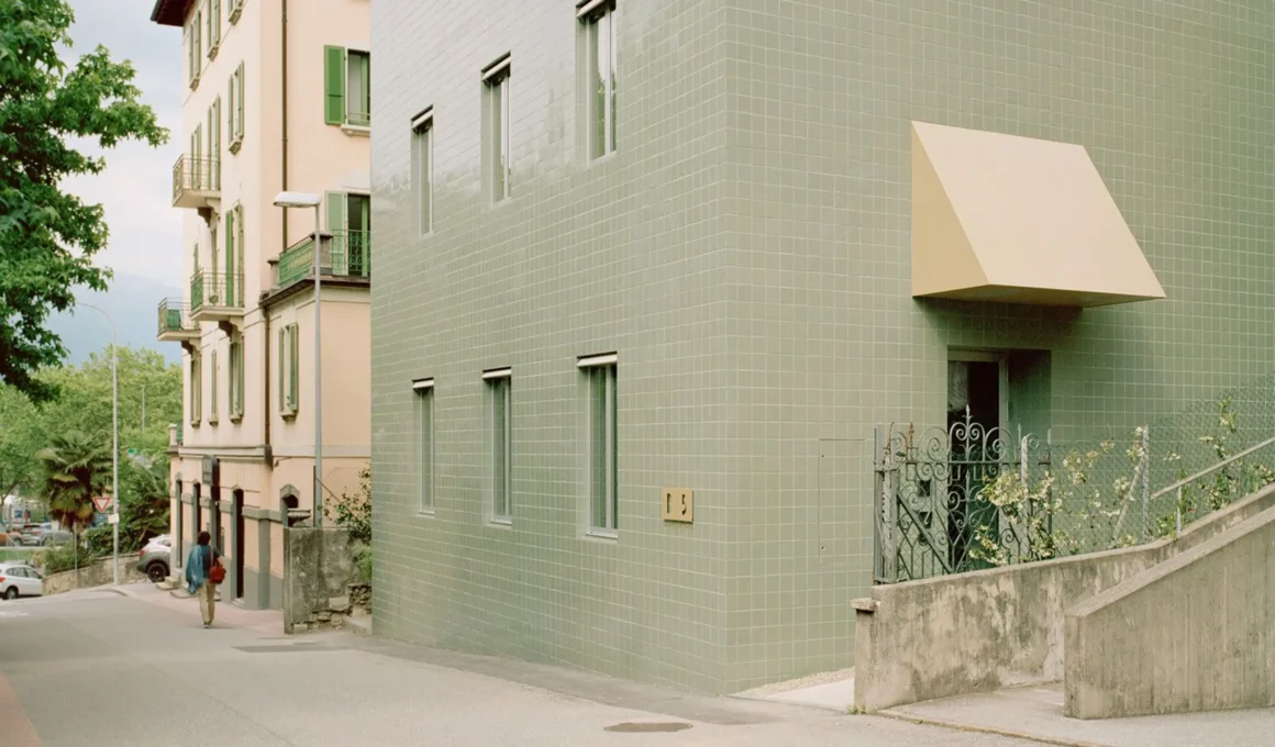 b5 Hotel Lugano: Green Tile Facade & Historic Layers by df__dc