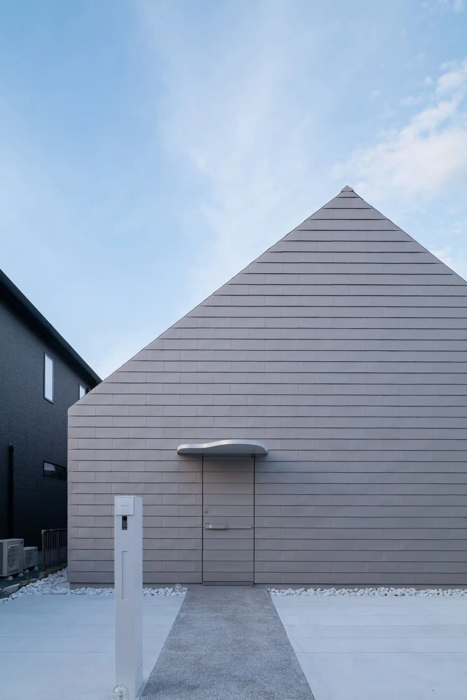 MASA Architects' IEIE House: A Town Within Walls