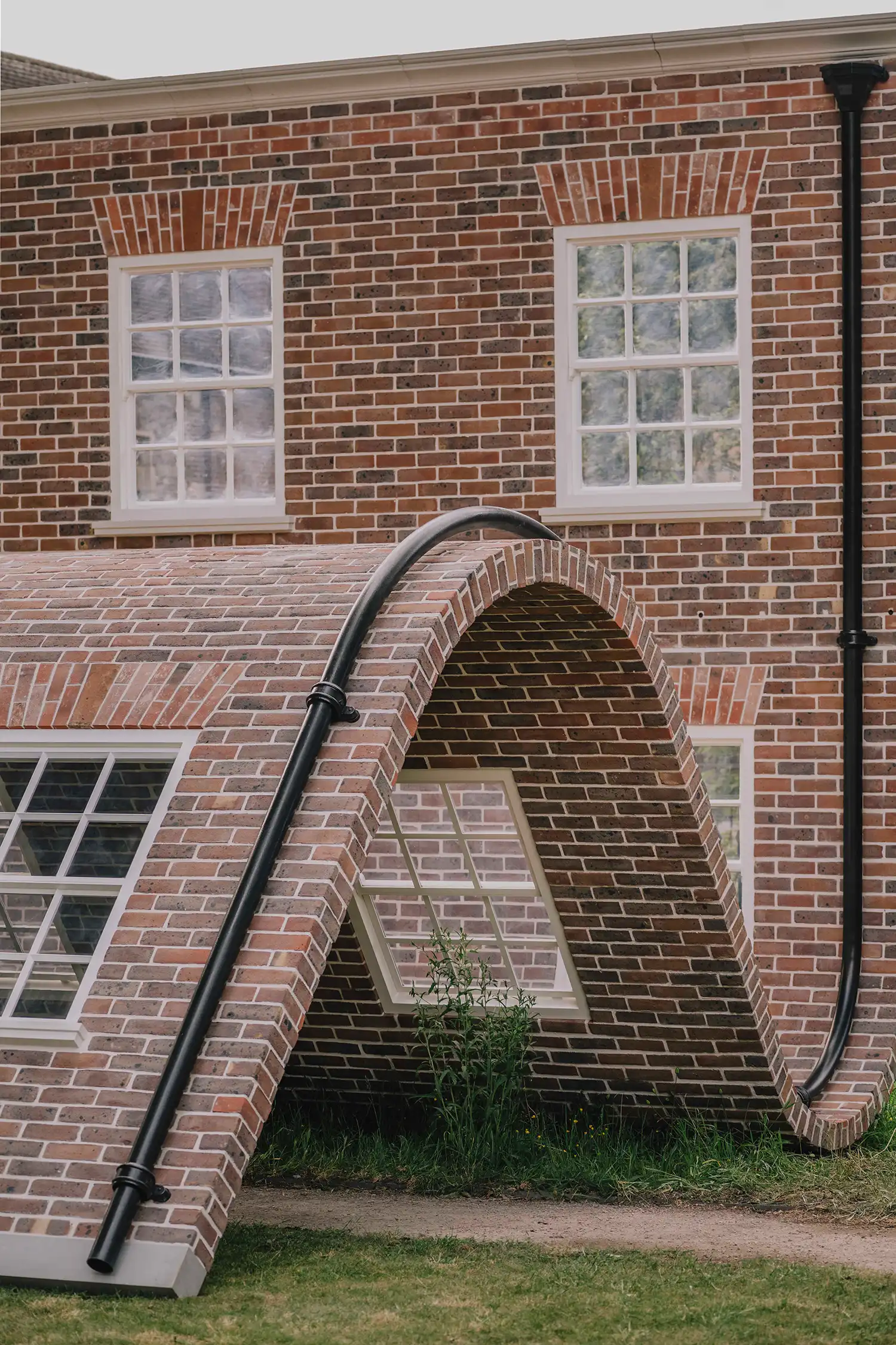 Alex Chinneck’s ‘A Week at the Knees’: Bending Brick Façade at Clerkenwell Design Week