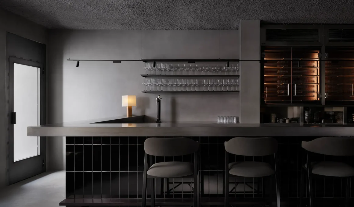 BAKKO Restaurant in Madrid Channels the Subtle Drama of Japanese Aesthetics Through Dark Materials and Shadow Play