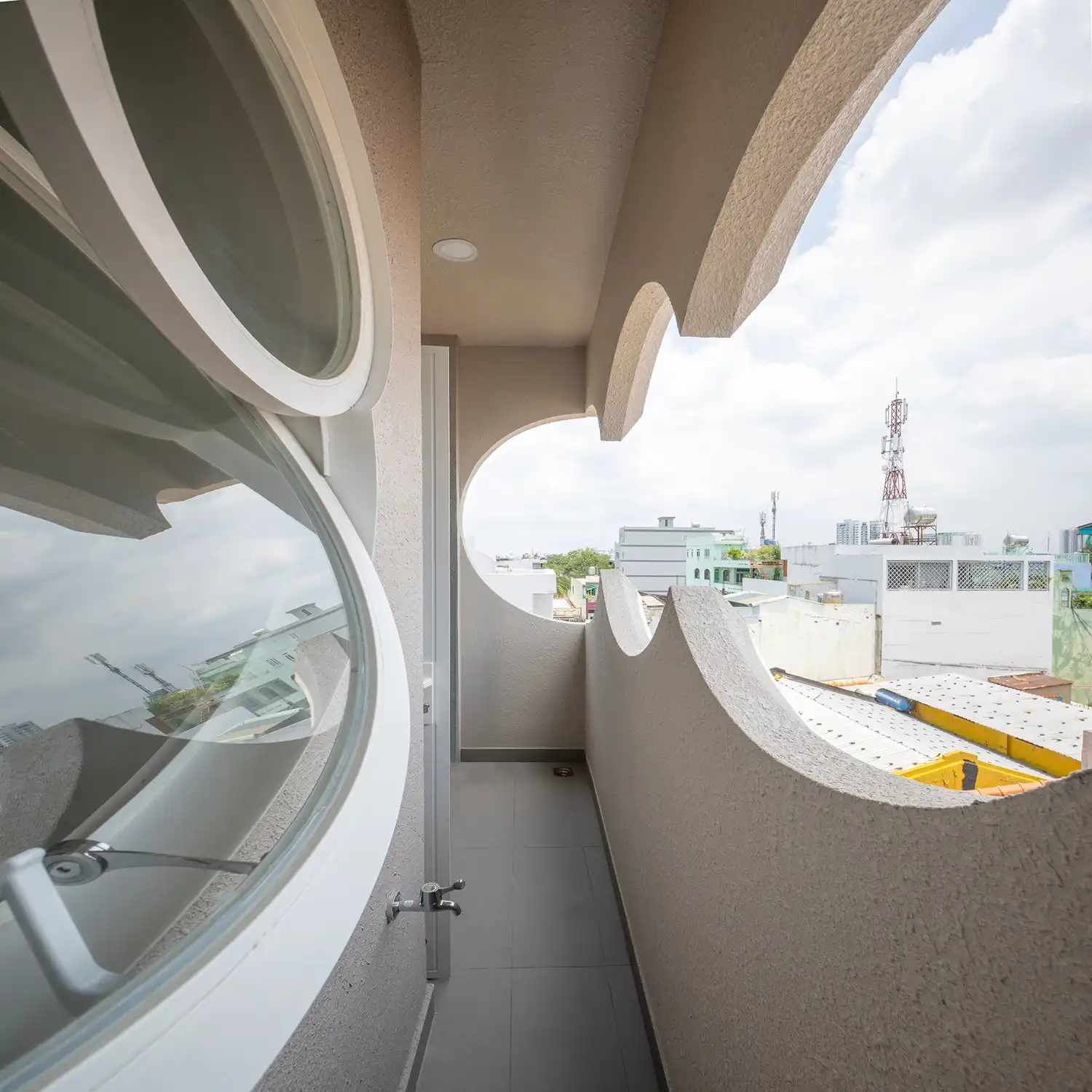 Cloud House by ROOM+ Design & Build: Urban Loft Living in Vietnam