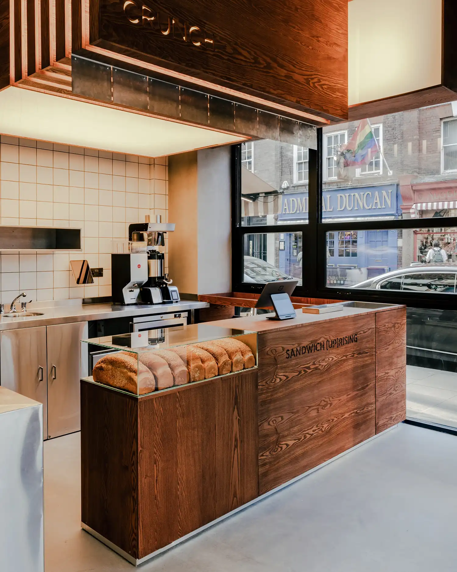 CRUNCH Sandwich Shop by KIDZ Studio: A Retro-Futuristic Design