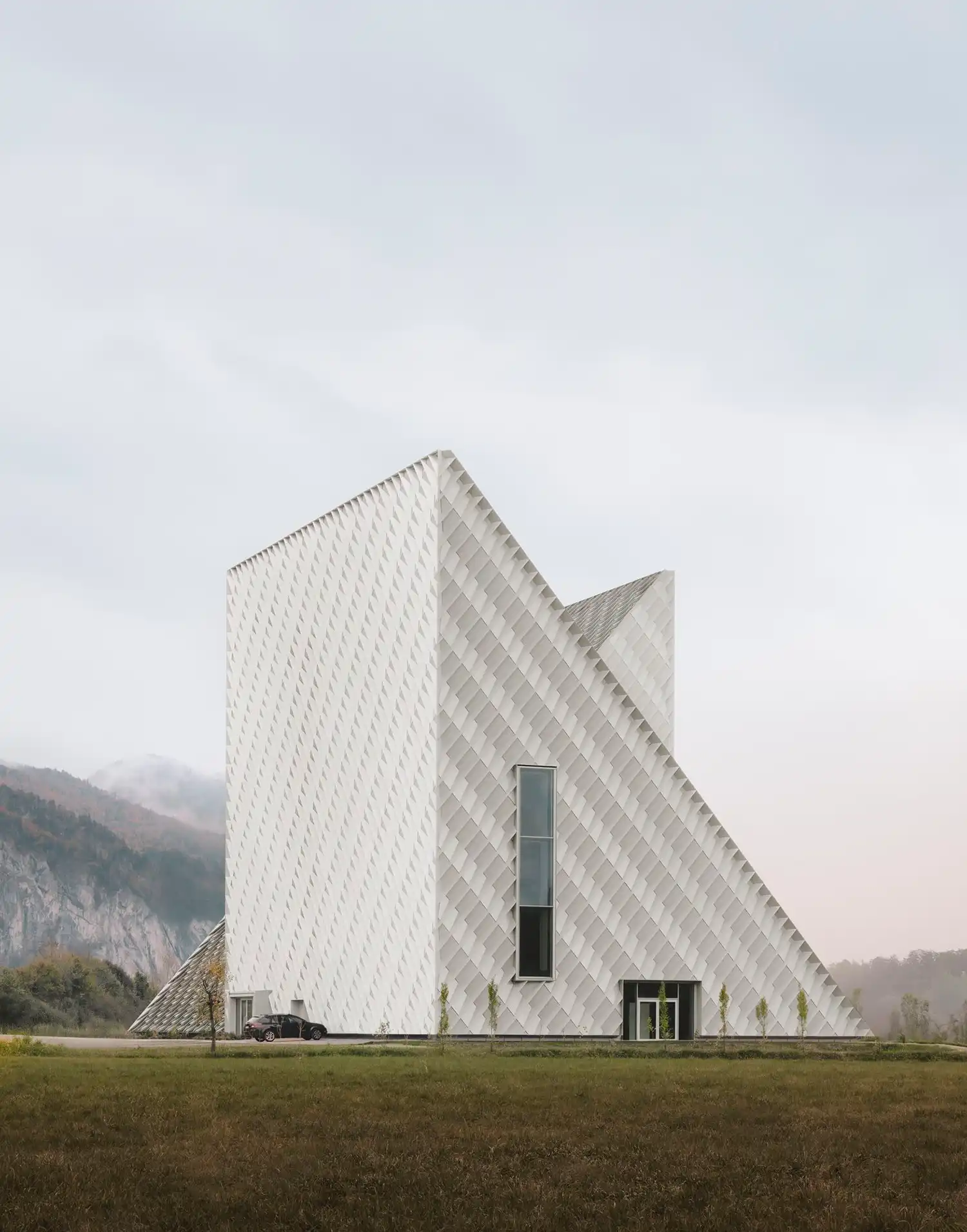 Beyond the Glass Box: Barozzi Veiga Carves a Sculptural Dynafit Headquarters in the Eno Valley