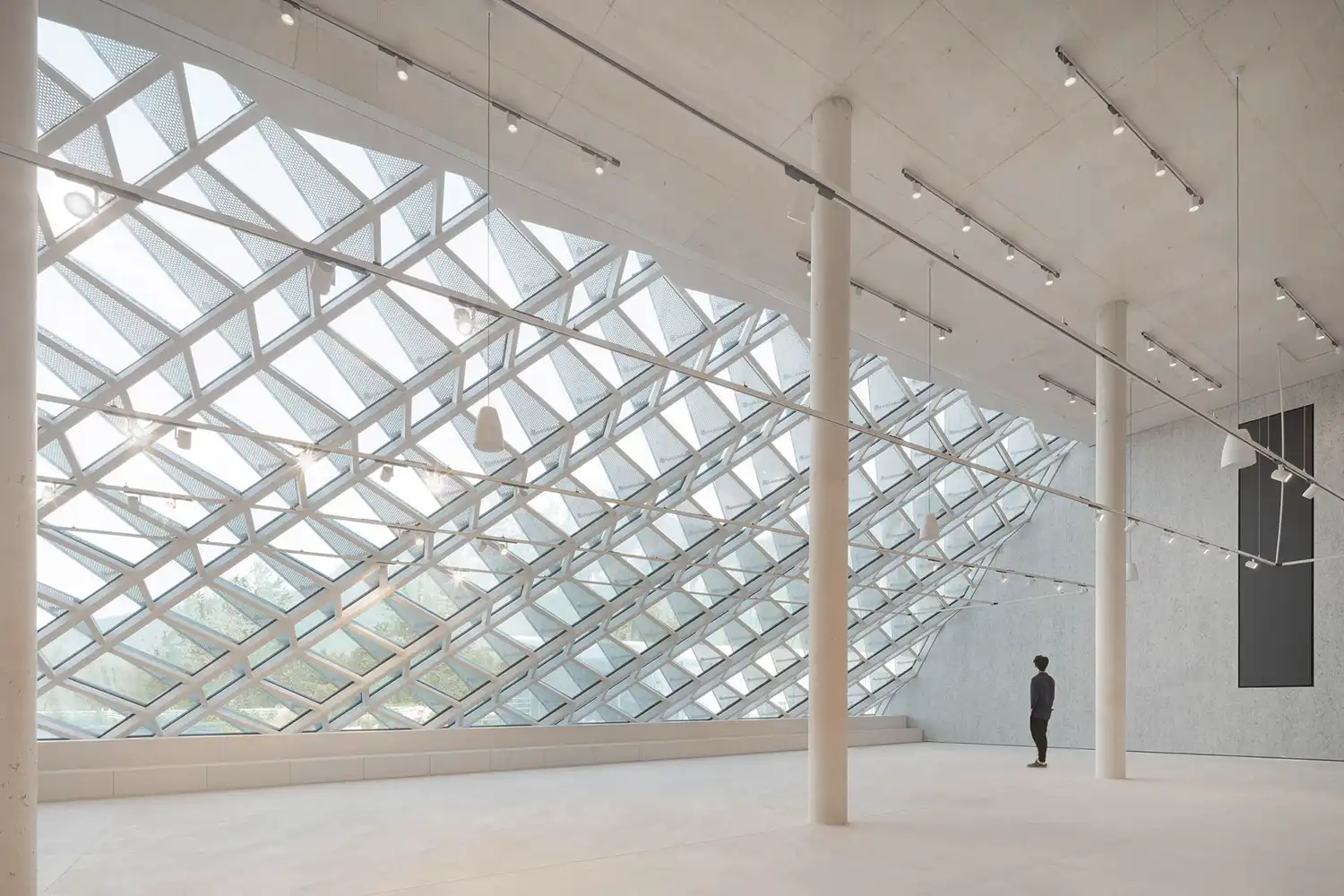 Beyond the Glass Box: Barozzi Veiga Carves a Sculptural Dynafit Headquarters in the Eno Valley