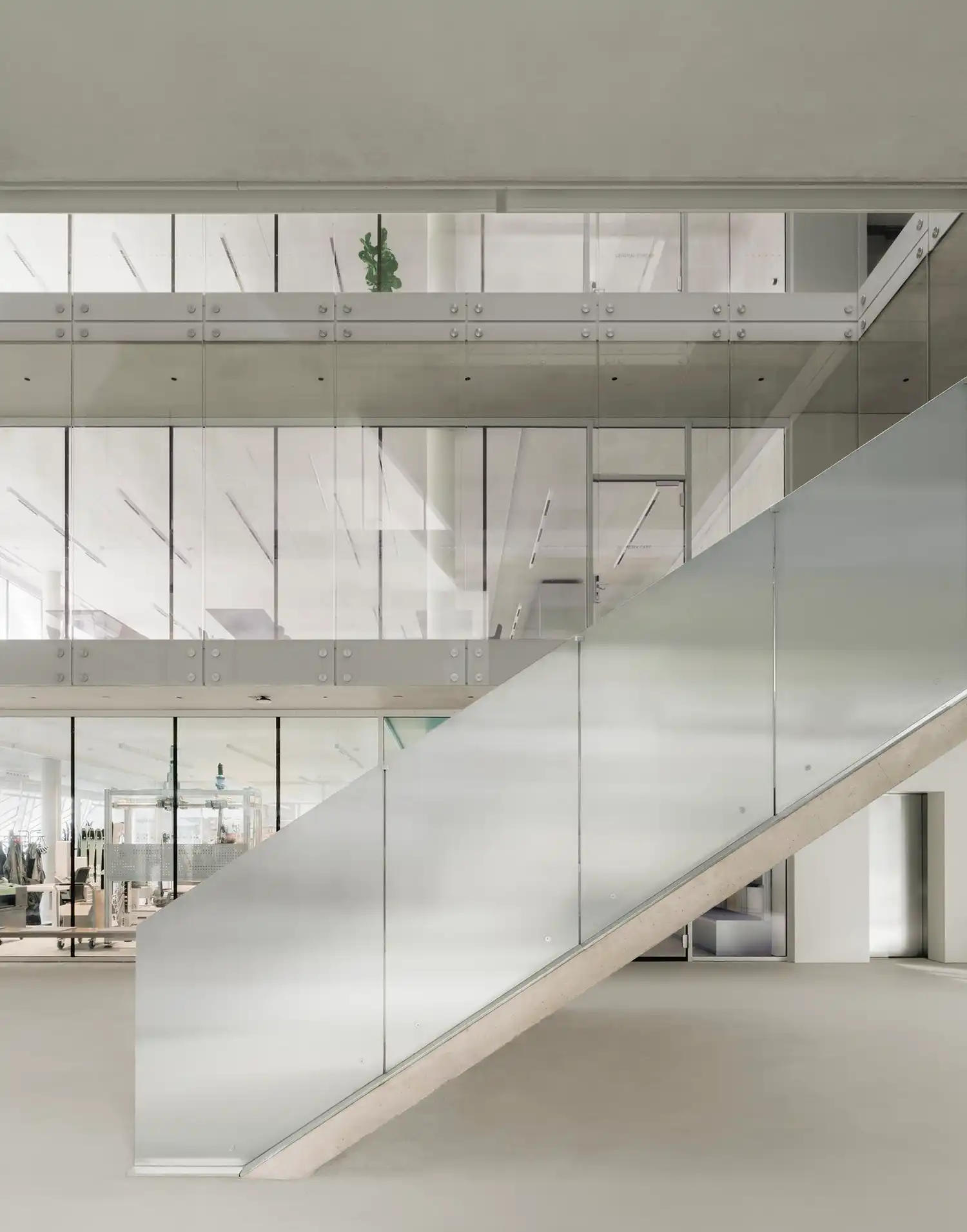 Beyond the Glass Box: Barozzi Veiga Carves a Sculptural Dynafit Headquarters in the Eno Valley