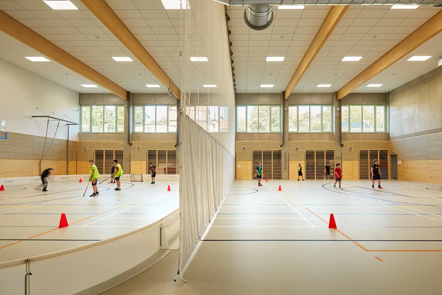 From Green Fencing to Speech Bubble Floors: Color Drives Design at ATELIER 6's Frič Brothers School