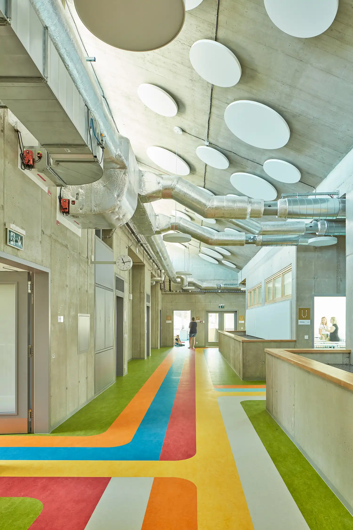 From Green Fencing to Speech Bubble Floors: Color Drives Design at ATELIER 6's Frič Brothers School