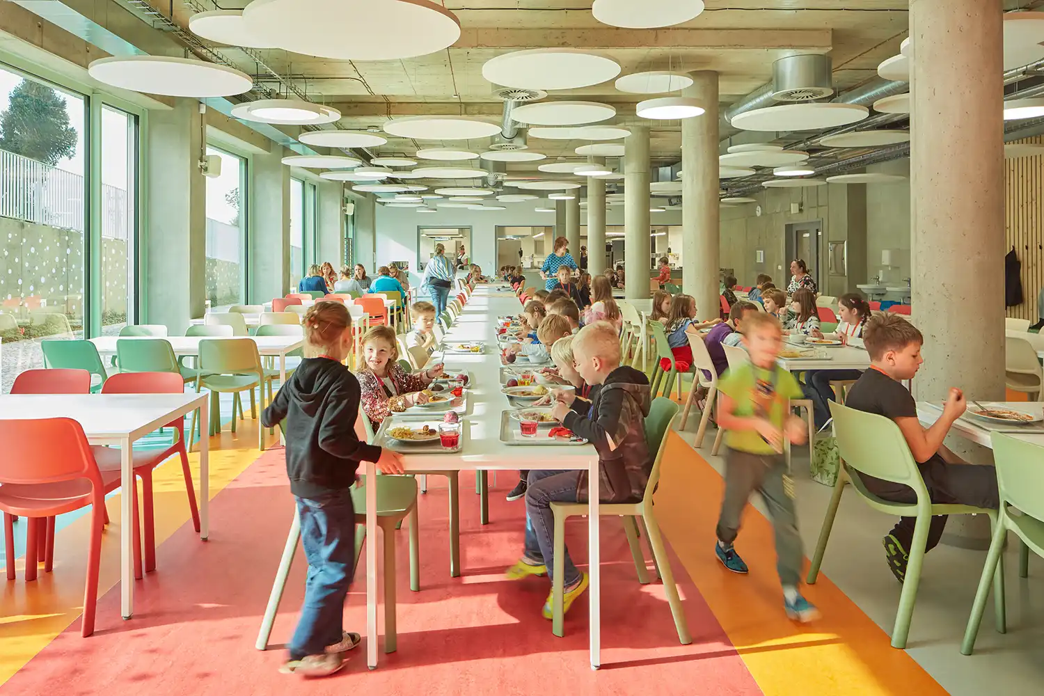 From Green Fencing to Speech Bubble Floors: Color Drives Design at ATELIER 6's Frič Brothers School