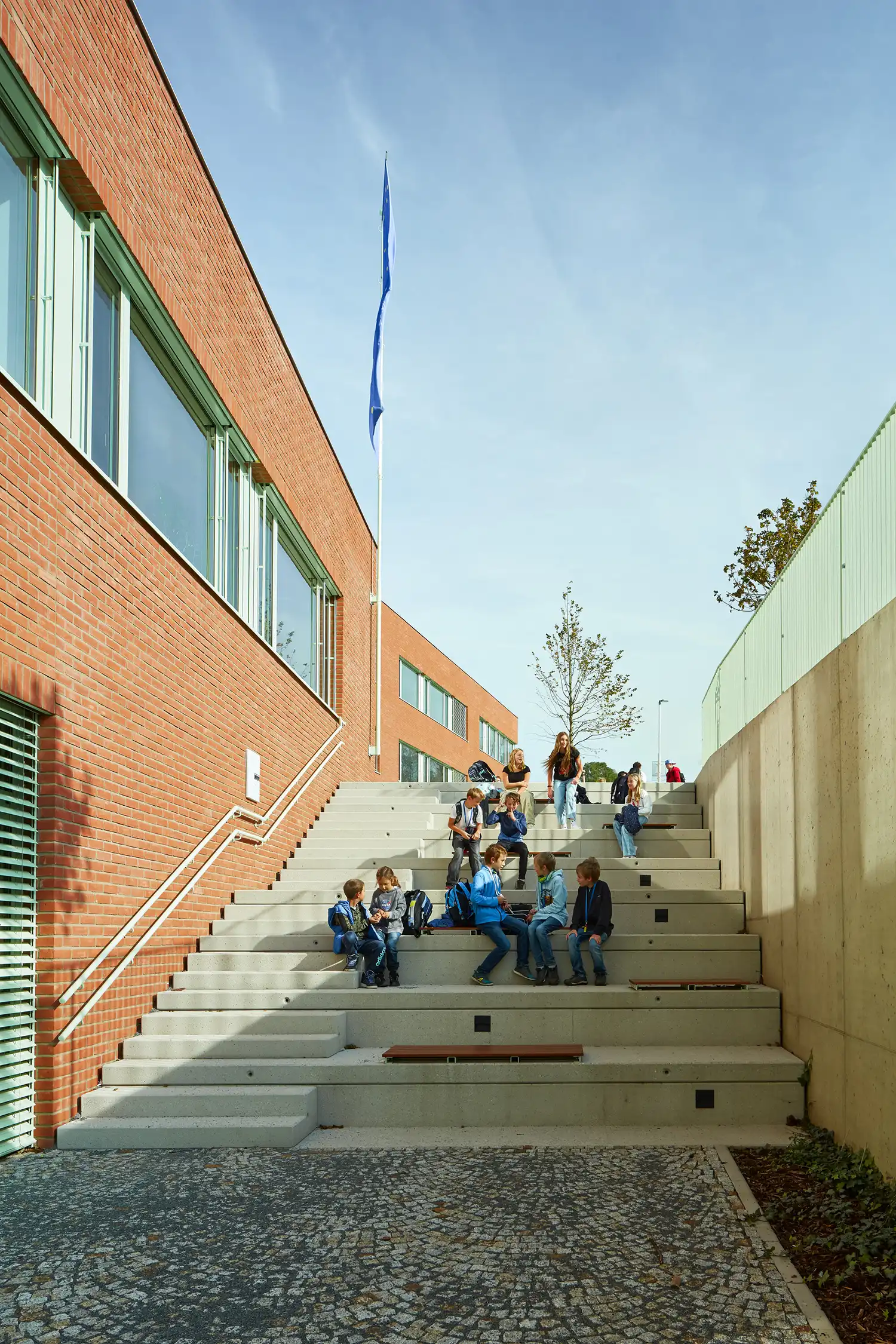 From Green Fencing to Speech Bubble Floors: Color Drives Design at ATELIER 6's Frič Brothers School