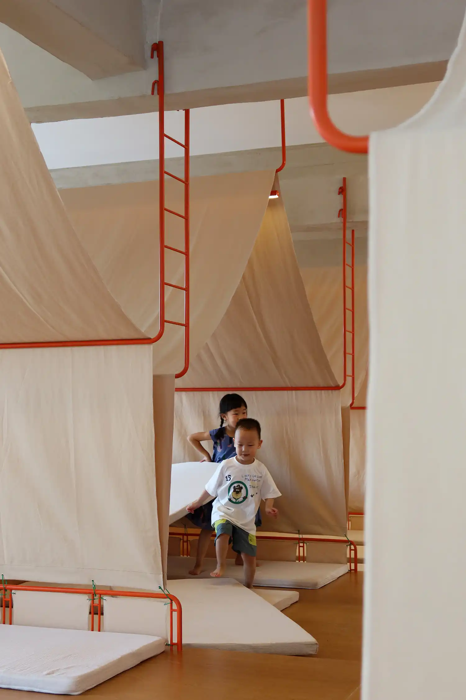 Playful Tents and Honest Materials: 11-Design Crafts a Whimsical Haven at DEYA Day Care Center
