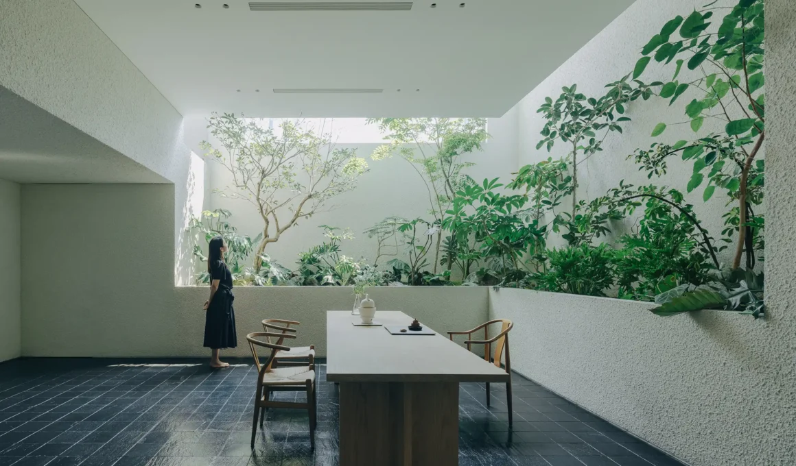 House J dining area immersed in overlaid gardens, Atelier About Architecture Beijing mountain residence interior design