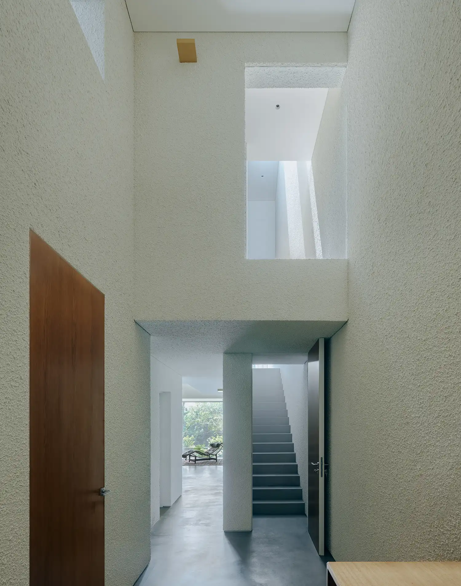 House J: Overlaid Gardens Luminous Sanctuary by Atelier About Architecture
