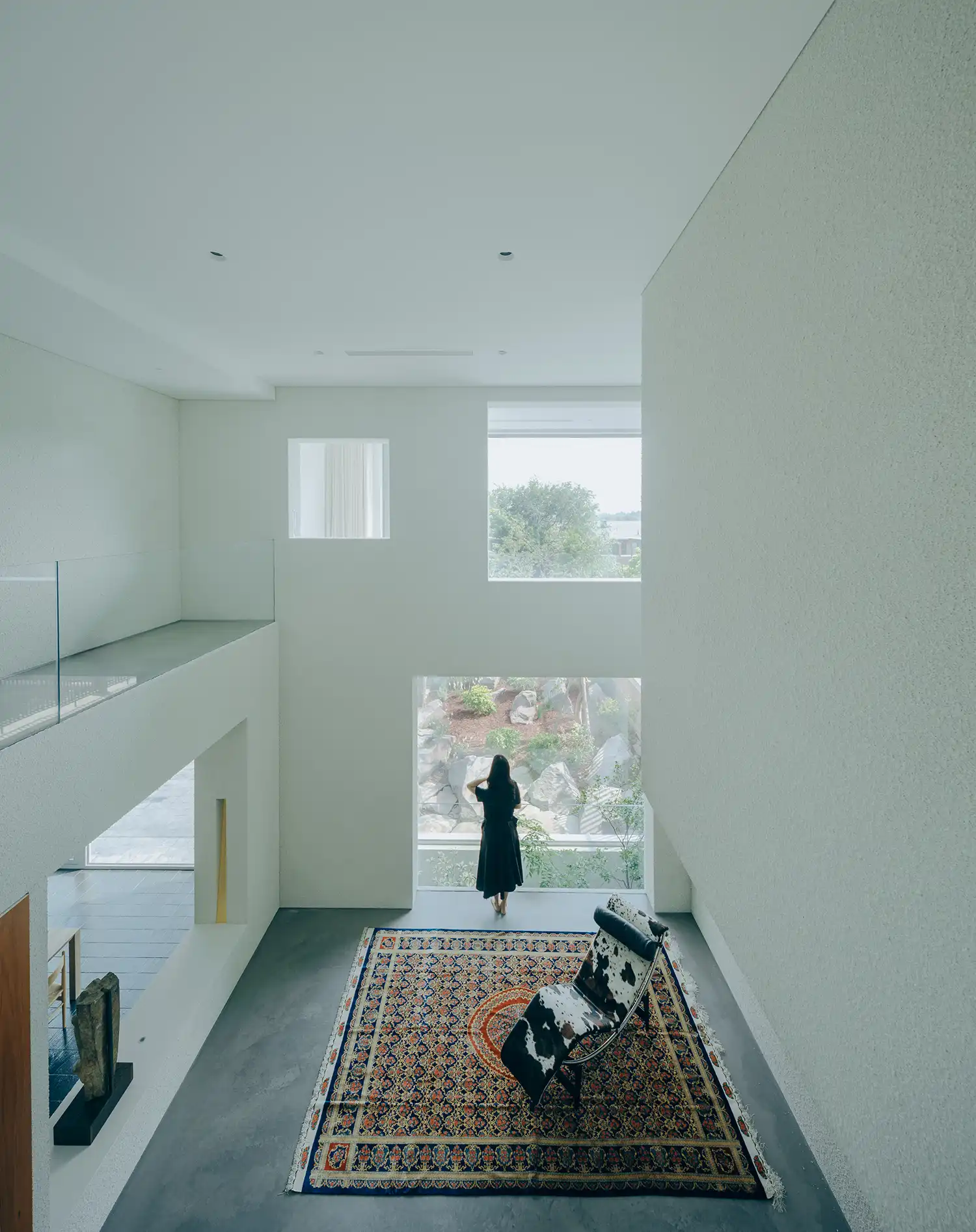 House J: Overlaid Gardens Luminous Sanctuary by Atelier About Architecture