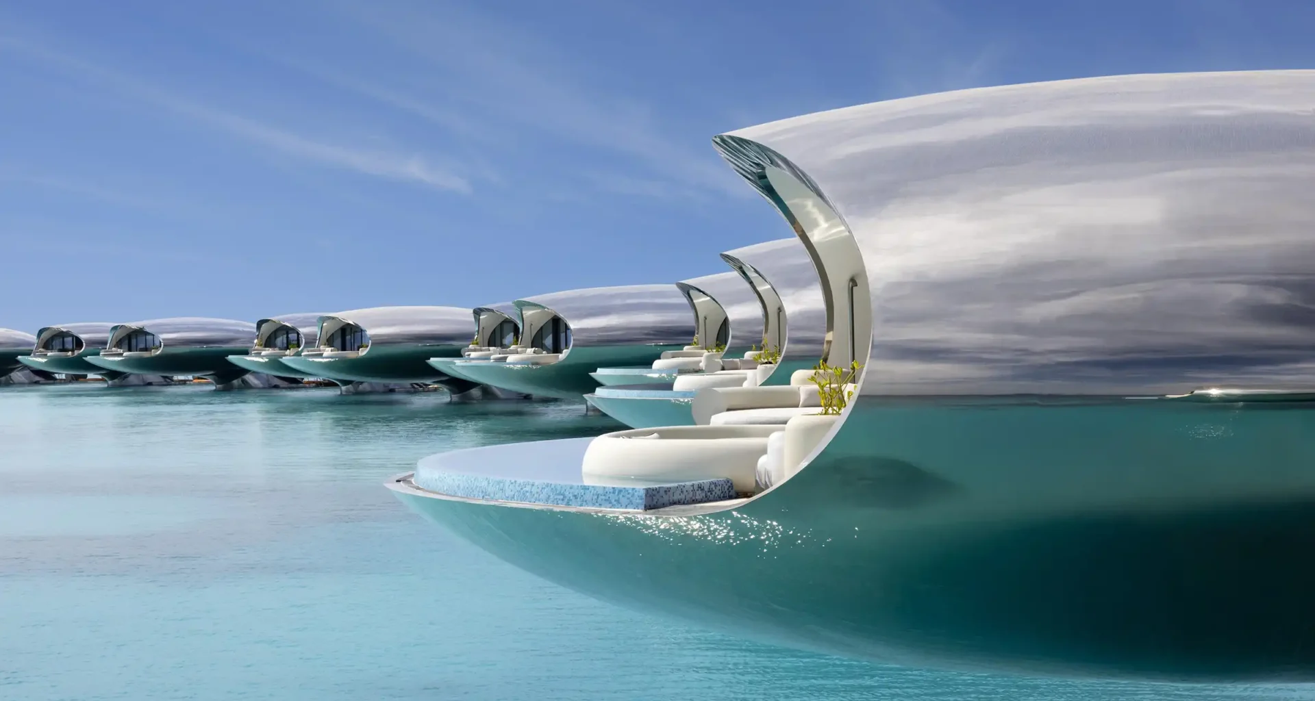 Killa Design's stainless steel Shebara Resort villa cantilevered over Red Sea at sunset | Sheybarah Island eco-luxury | Solar powered reflective architecture