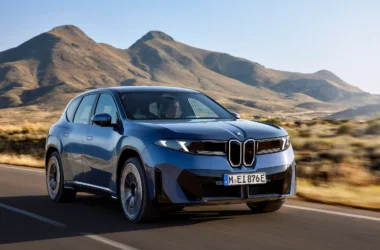 All-new BMW iX3 Neue Klasse electric SAV in motion, showcasing its revolutionary design and panoramic digital cockpit.
