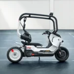 BMW Motorrad Vision CE electric motorcycle vision vehicle in matt white with black safety cage, showcasing its helmet-free self-balancing design for urban mobility.