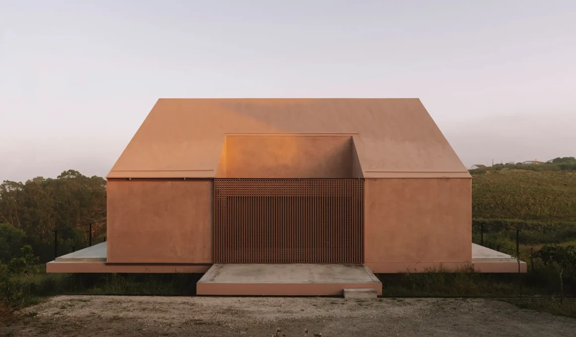 Casa Plaj cantilevered concrete holiday home by extrastudio architects overlooking the sea in Lourinhã, Portugal.